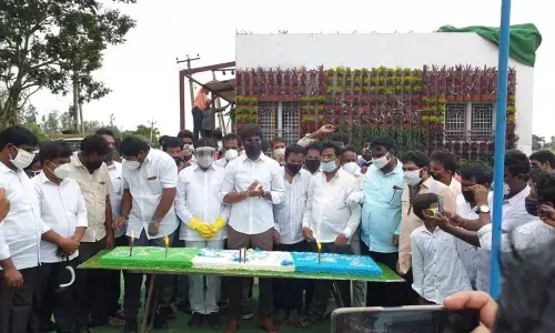 MP Margani Bharat Ram inaugurating model house in Jegurupadu village on Monday