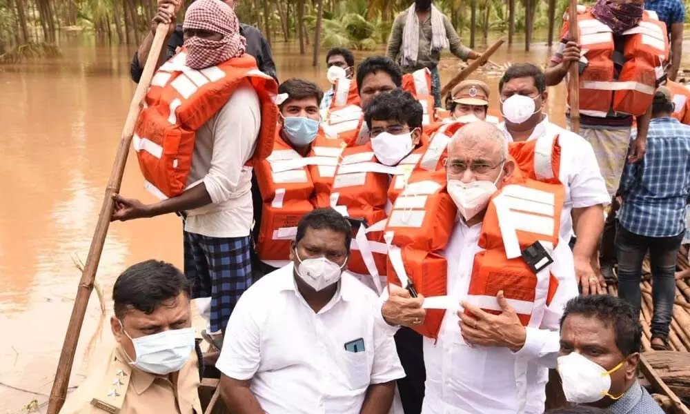 BC Welfare Minister Chelluboyina Venugopalakrishna and officials visiting flood-affected areas