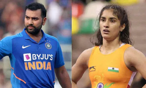 Rohit Sharma and wrestler Vinesh Phogat