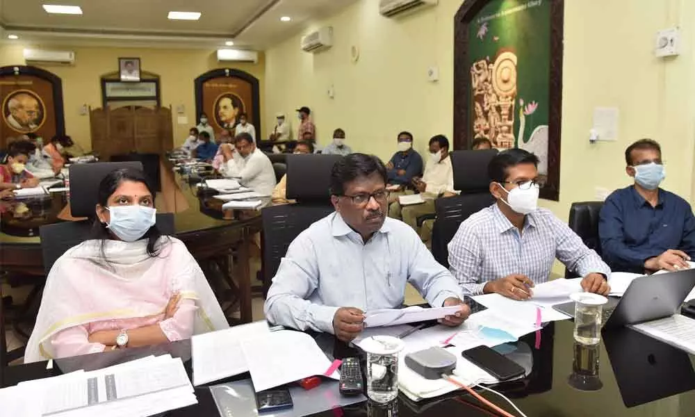 District Collector I Samuel Anand Kumar addressing a videoconference from the Collectorate in Guntur on Tuesday