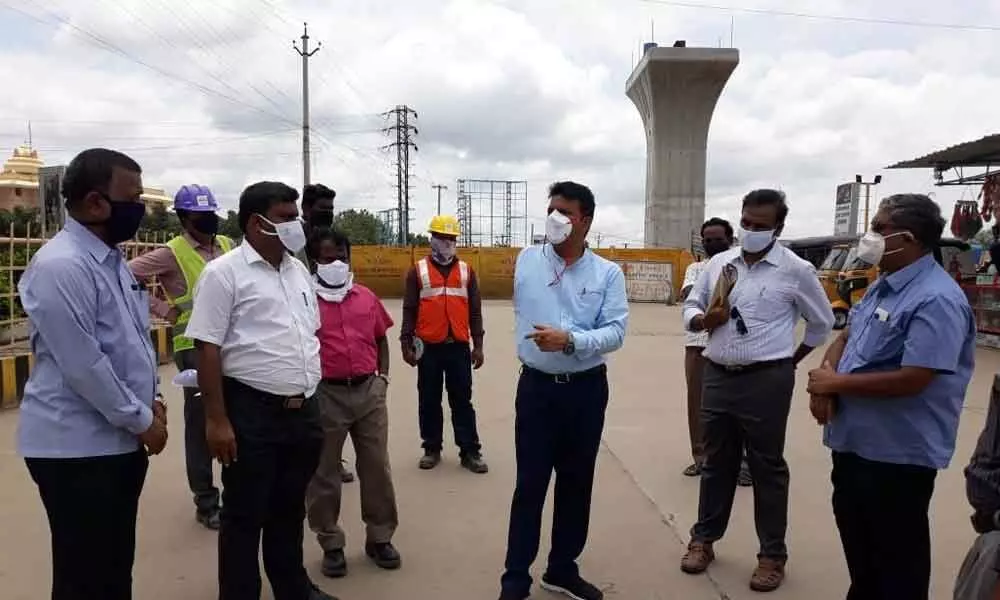 MCT Commissioner P S Girisha inspecting Garuda flyover works in Tirupati on Tuesday