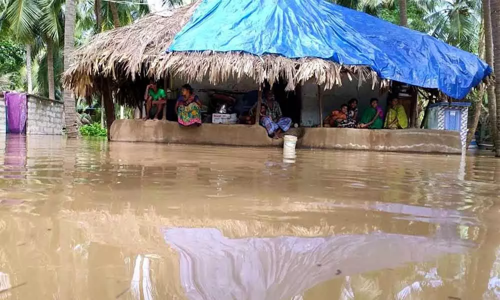 A house submerged in floodwater in Konaseema area in East Godavari district on Tuesday