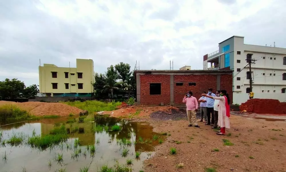 Municipal Commissioner V Kranthi inspecting the colonies on the outskirts of Karimnagar city on Wednesday