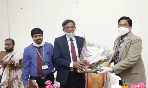 Prof Tejaswi Kattamani taking charge as VC of Central Tribal University in Vizianagaram on Thursday. Prof H Lajapathi Rai is also seen
