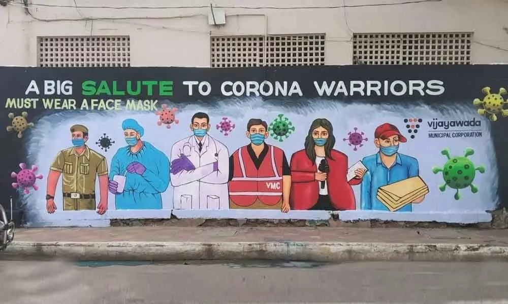 A wall painting part of Vijayawada Municipal Corporations fight against Covid-19