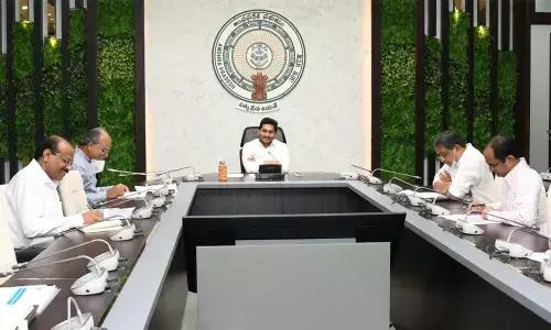 Chief Minister YS Jagan Mohan Reddy reviewing Covid-19 situation with officials at Tadepalli on Friday