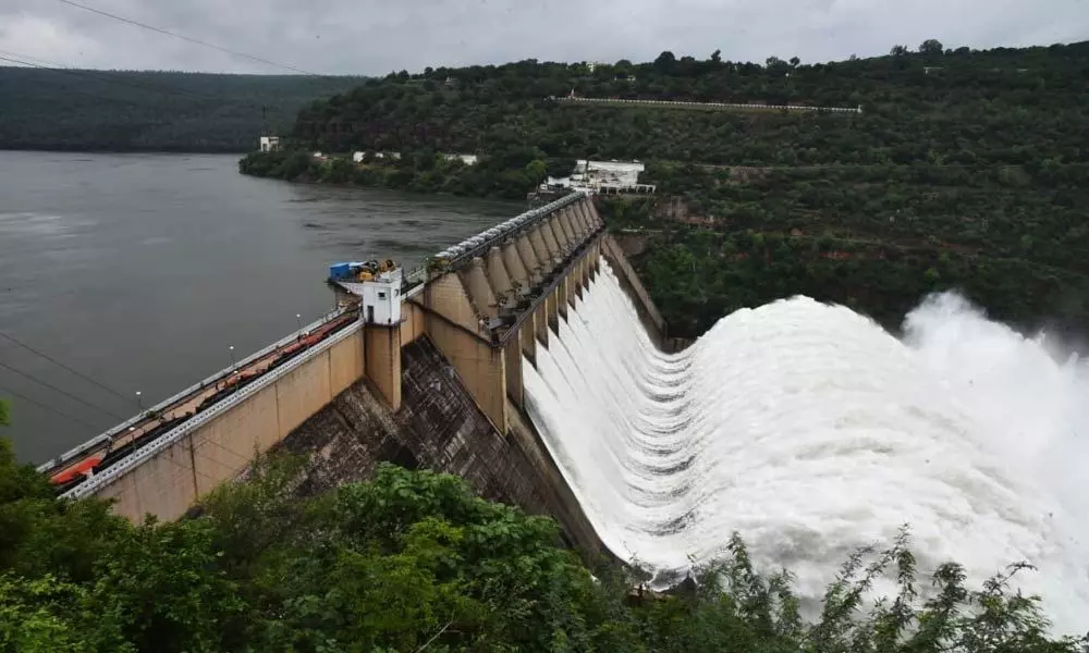 Krishna water being released from Srisailam Dam on Friday after lifting 10 crest gates to Nagarjuna Sagar Dam