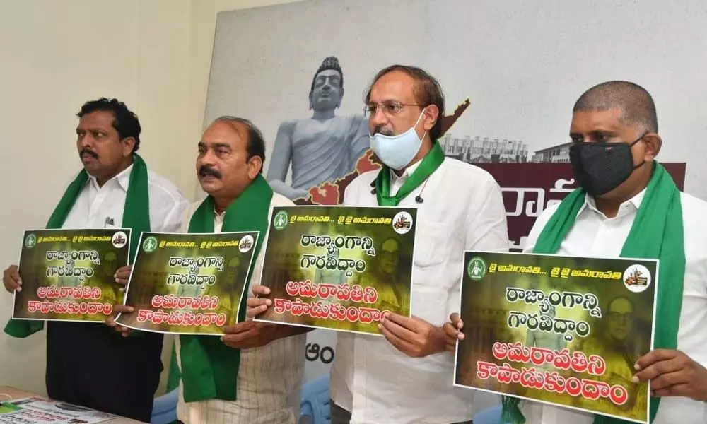 JAC leaders Siva Reddy, RV Swamy, G Tiriupati Rao and Mallikarjuna Rao releasing the wall poster on Friday for the demonstrations planned to be conducted on Sunday