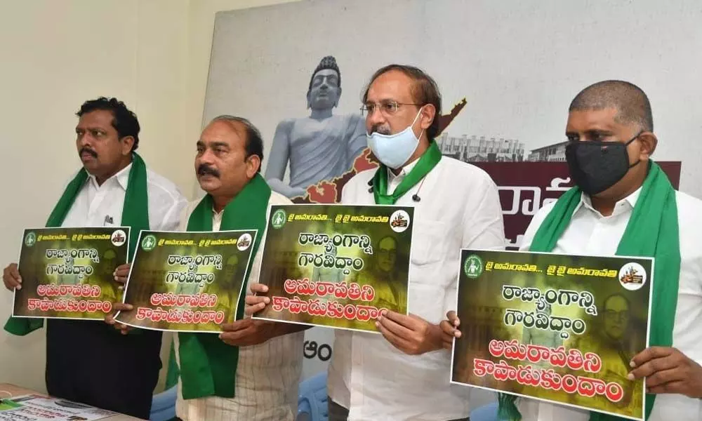 JAC leaders Siva Reddy, RV Swamy, G Tiriupati Rao and Mallikarjuna Rao releasing the wall poster on Friday for the demonstrations planned to be conducted on Sunday