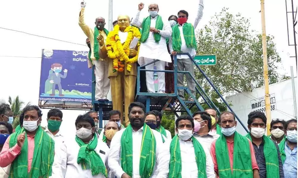 Rural MLA Gorantla Butchaiah Choudary and others after submitting a memorandum to Ambedkar statue at Gokavram