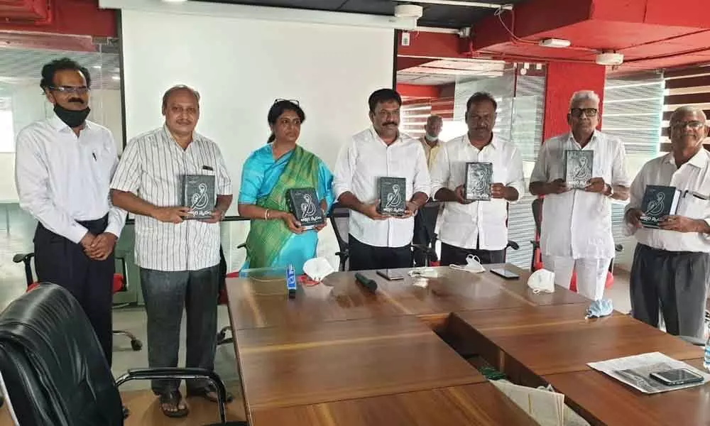 Participants at the book release programme in Vijayawada