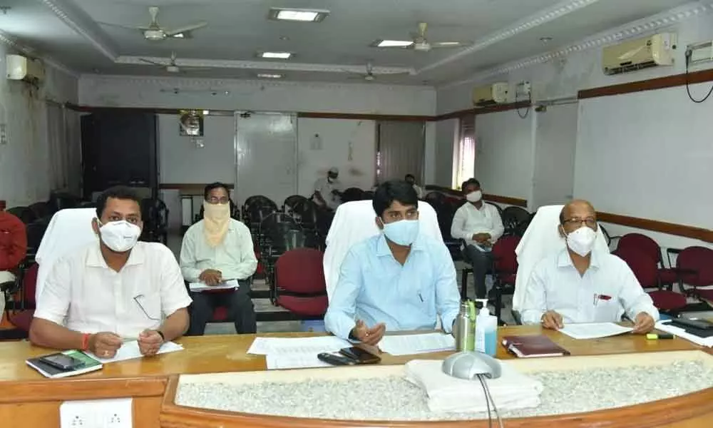 District Collector during a video conference with PACs’ CEOS and agriculture officials in Nizamabad on Monday