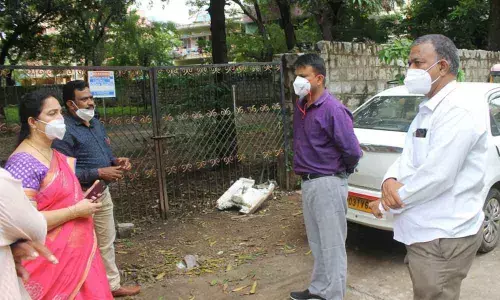 MCT Commissioner PS Girisha and Health Officer Sudharani inspecting a site for setting up a new PHC at Venkatraman layout in Tirupati city