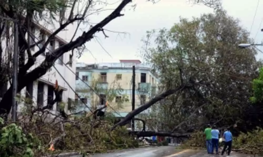 Cuban firefighters battle blazes after storm lashes island