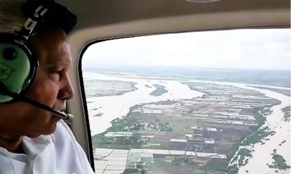 CM Yediyurappa Takes Aerial Survey Of Flood-Hit Districts