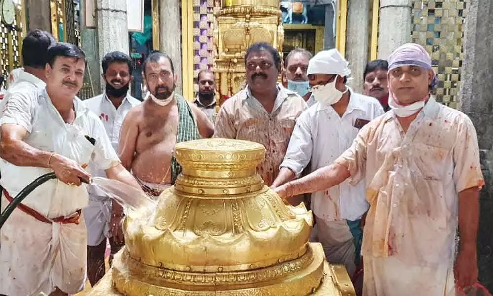 Priests and officials taking part in Koil Alwar Tirumanjanam at Goddess Padmavathi temple in Tiruchanoor on Tuesday