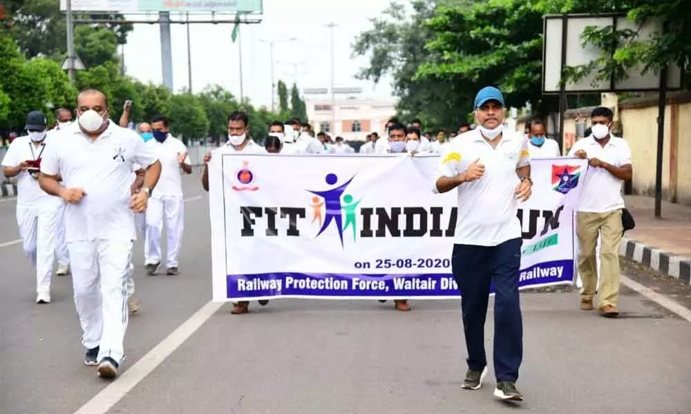 Railway Protection Force personnel taking part in the Fit India Run in Visakhapatnam on Tuesday