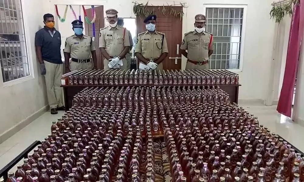 7 arrested, 1,052 liquor bottles seized in Vijayawada