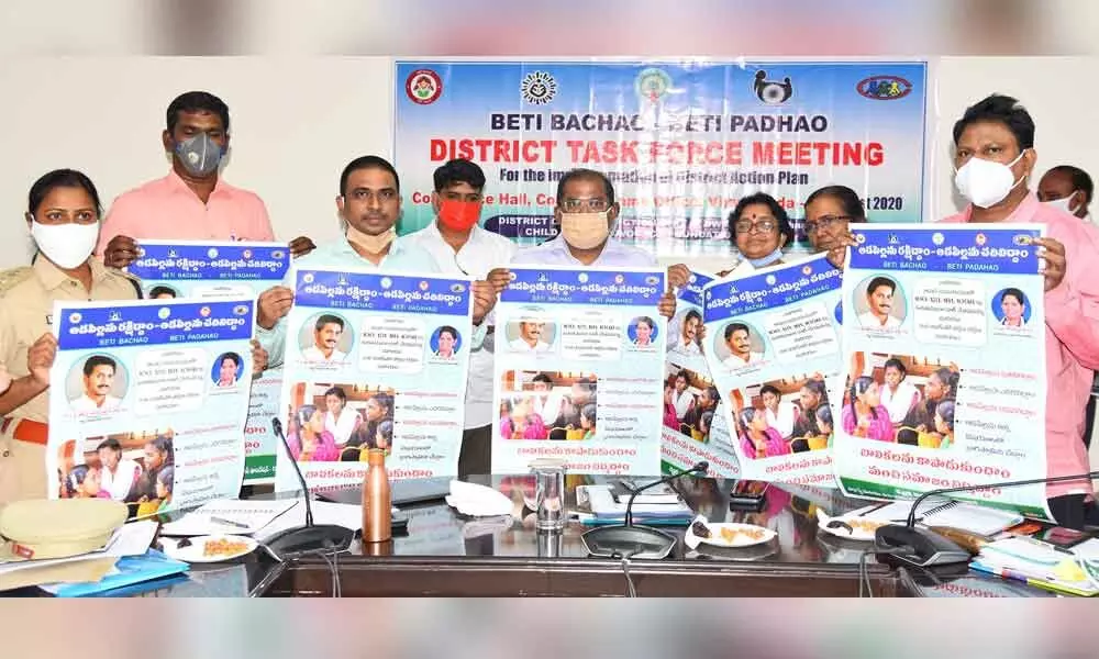 Krishna District Collector Md Imtiaz and others releasing poster on ‘Beti Bacho- Beti Padhao’ in Vijayawada on Tuesday