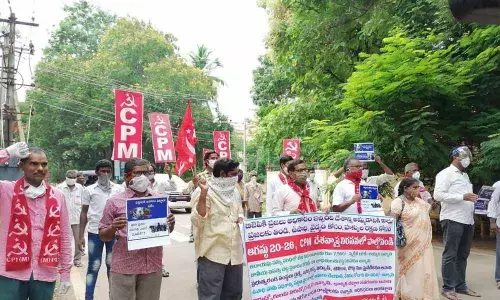 CPM leaders staging a dharna