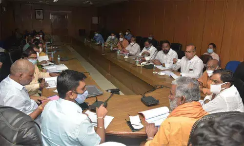 Deputy CM K Narayana Swamy and Minister for Panchayat Raj P Ramachandra Reddy at the Covid-19 Task Force meeting