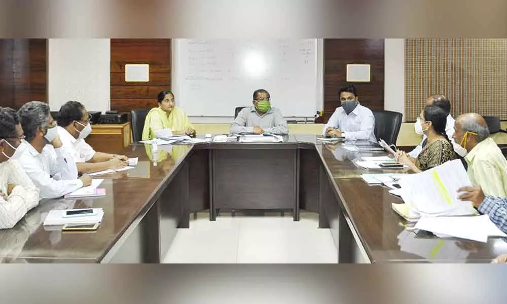 Collector Md Imtiaz holding a meeting with officials in Vijayawada on Wednesday