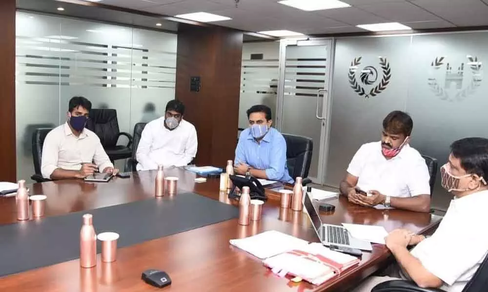 Municipal Administration Minister KT Rama Rao holding a meeting on the progress of double bedroom houses construction at Hyderabad on Wednesday