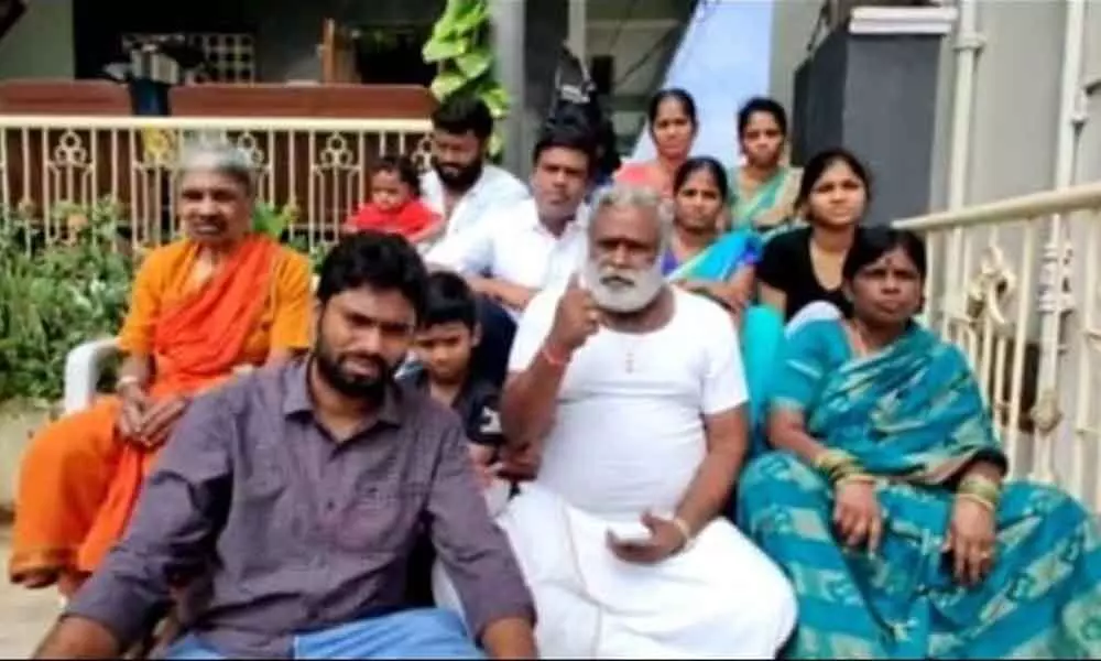 TRS State secretary Ande Babaiah with his family members