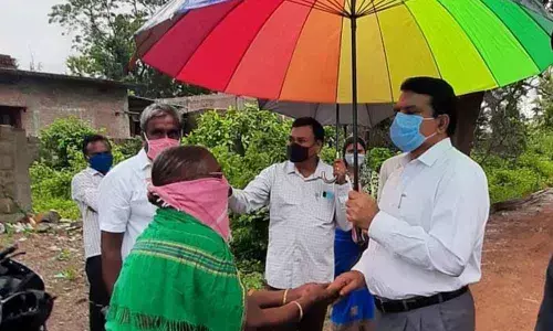 An aged woman Veyya Somamma appealing to District Collector Dr MV Reddy for sanction pension to her at Mallelamadugu village on Wednesday