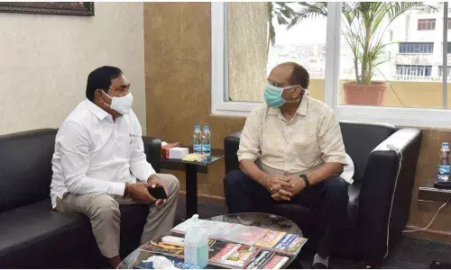 Panchayat Raj minister Errabelli Dayakar Rao holding discussion with Chief Secretary Somesh Kumar in Hyderabad on Thursday