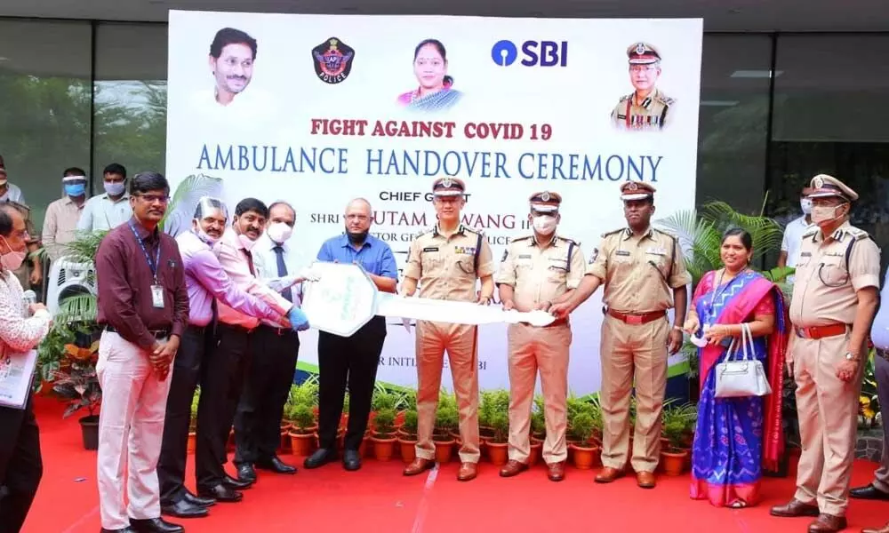 SBI officials handover keys to the DGP at the State police office near Mangalagiri on Thursday