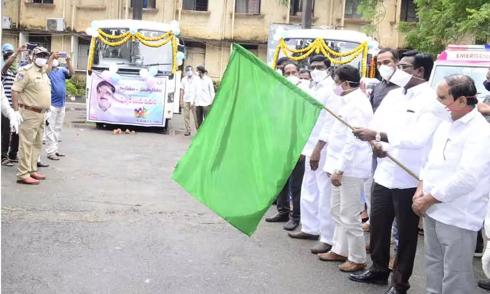 Transport Minister P Ajay Kumar launching three mobile testing Covid labs in Khammam on Thursday