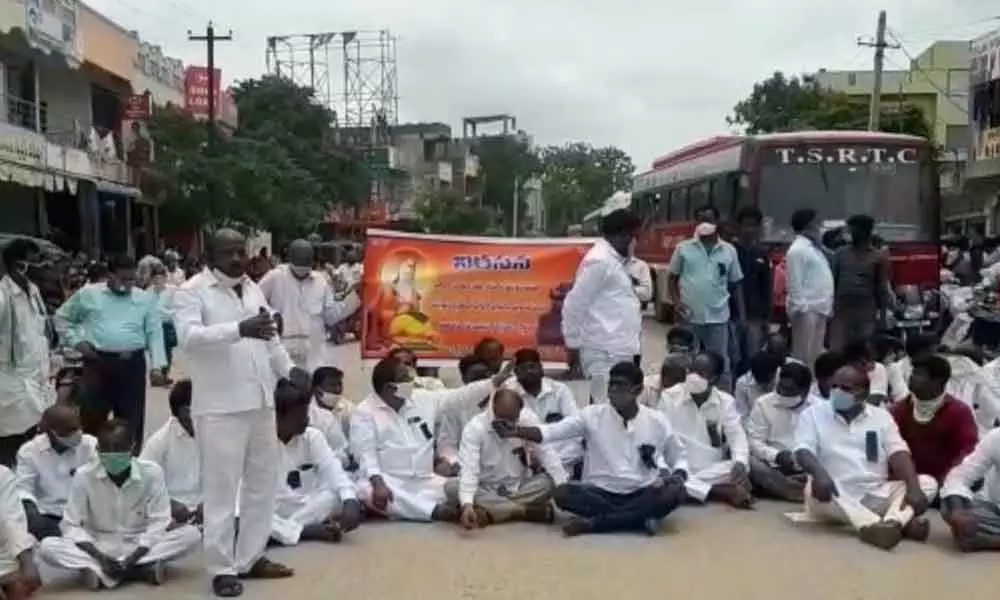 Valmiki Sangam members staging a roadblock in Pebbair on Thursday