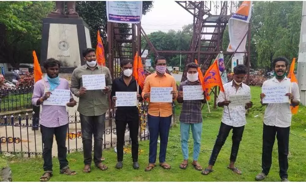Akhil Bharatiya Vidyarthi Parishad activists staging a protest in Warangal on Thursday