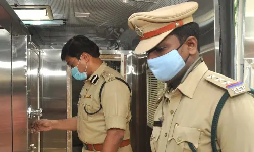 SP Ranganath examining the mobile restrooms vehicle at DPO premises in Nalgonda on Friday