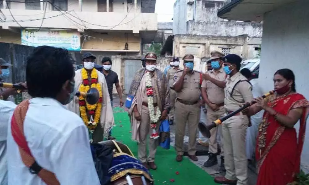 Police officials complimenting plasma donors at SP office in Kakinada on Sunday