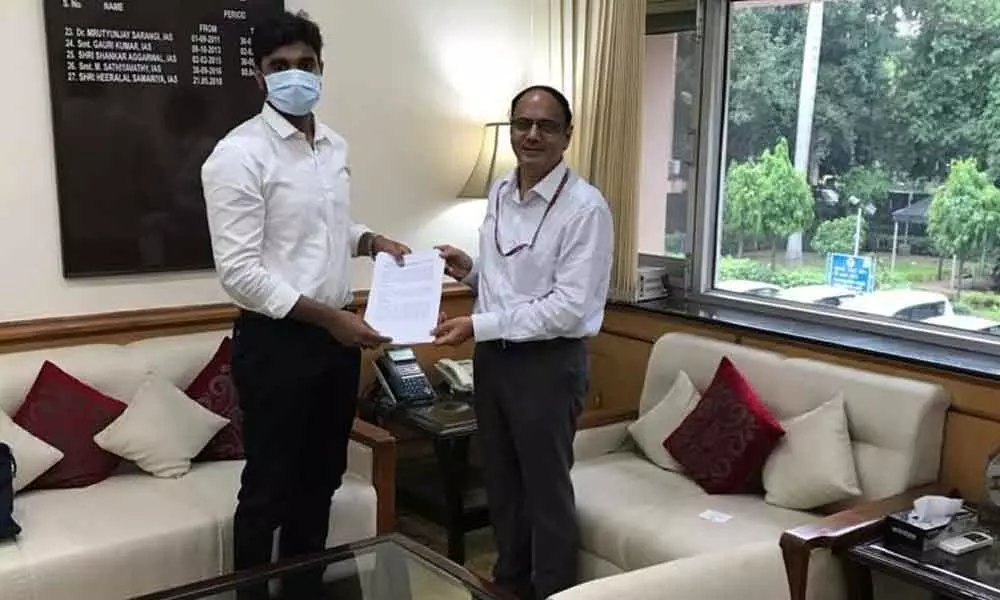 MP Margani Bharat Ram submitting a memorandum to Labour and Employment secretary Heeralal Samaria in New Delhi