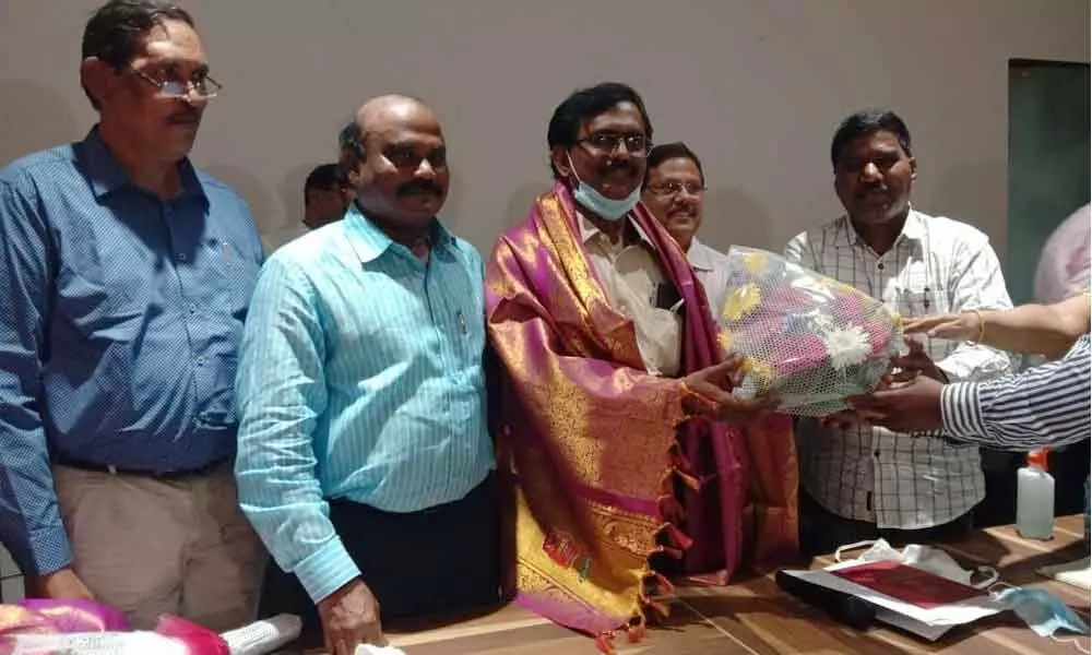 Karla Dharmachandra Reddy being felicitated after he was elected president of AP Civil Servants Association in Vijayawada on Sunday