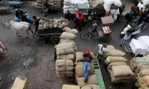 Indian economy likely to see record quarterly slump as pandemic hits