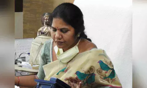 GMC Commissioner Challa Anuradha conducting ‘Dial Your Commissioner’ programme in Guntur on Monday