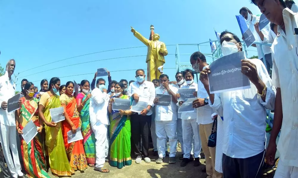 YSRCP leaders after garlanding the statue of B R Ambedkar