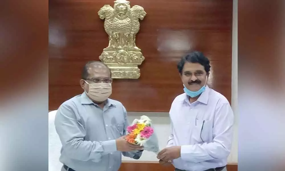 Dr Sastry meeting Krishna District Collector Md Imtiaz at the latter’s camp office in Vijayawada on Monday