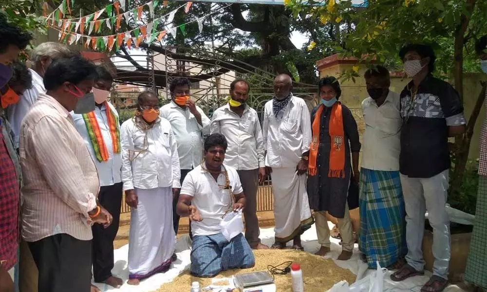 BJP leaders staging a protest in Buchireddypalem on Monday