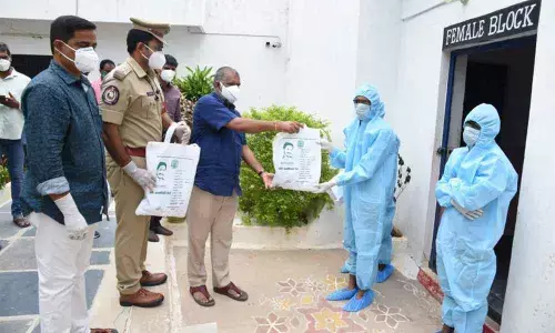 TUDA Chairman Chevireddy Bhaskar Reddy distributing Covid kits for infected prisoners in Tirupati Sub-Jail on Tuesday