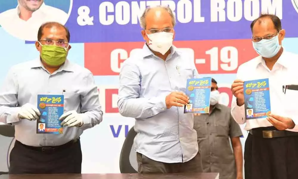 Special Chief Secretary KS Jawahar Reddy (middle) and Krishna District Collector Md Imtiaz (Left) released a book “Coronavirus – Mundu Jagrathale Mandu Vaidyam” written by Dr T Seva Kumar (Right), after the press conference on Tuesday
