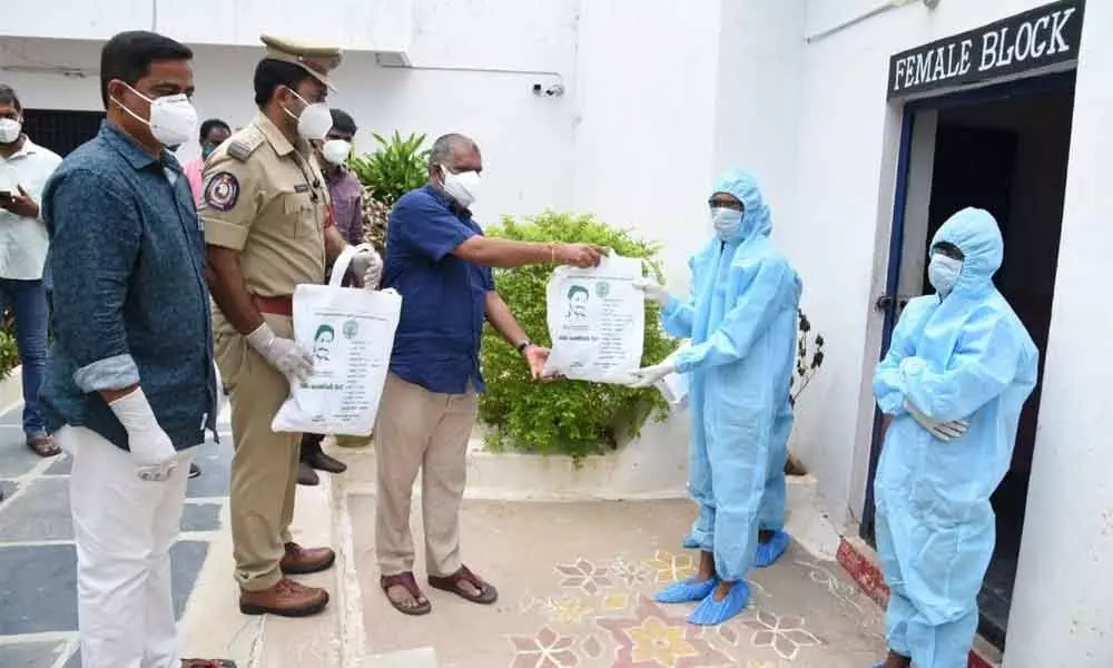 TUDA Chairman Chevireddy Bhaskar Reddy distributing Covid kits for infected prisoners in Tirupati Sub-Jail on Tuesday