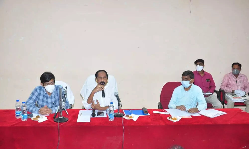 SUDA Chairman Bachu Vijay Kumar speaking at a review meeting at TTDC