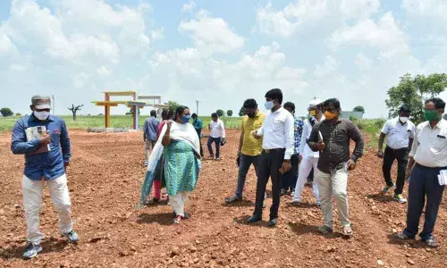 District Collector Bharati Hollikeri inspecting the construction works of Rythu Vedika at Sudhala village on Thursday