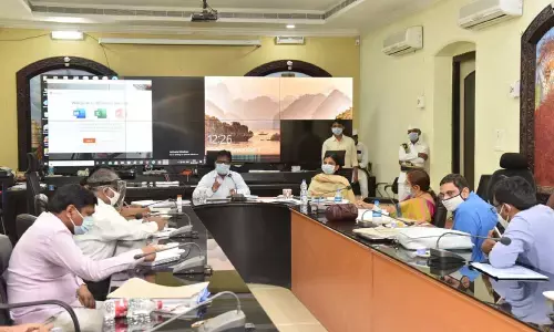 District Collector I Samuel Anand Kumar speaking at a meeting in Guntur on Thursday