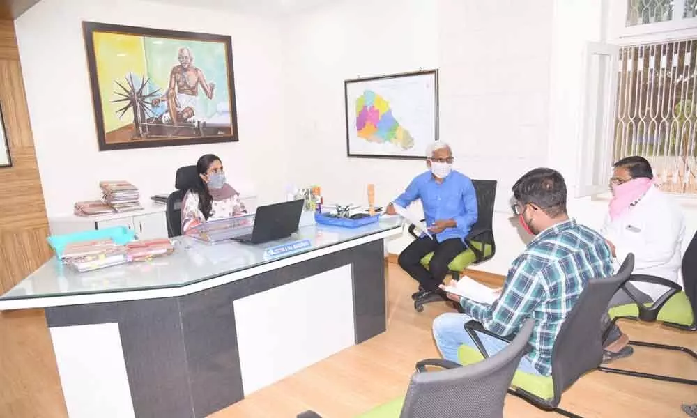 District Collector Sruthi Ojha during a review meeting with rice millers, civil supplies officials and FCI authorities at her chamber in Gadwal on Thursday